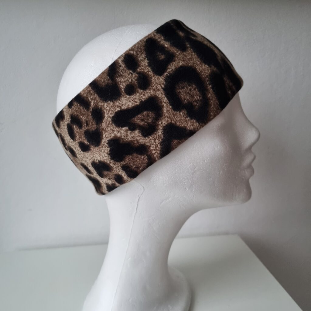 Fodrat pannband leopard brun