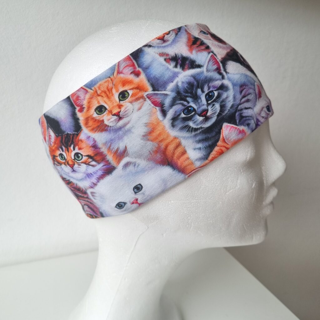 Pannband katt och blommor