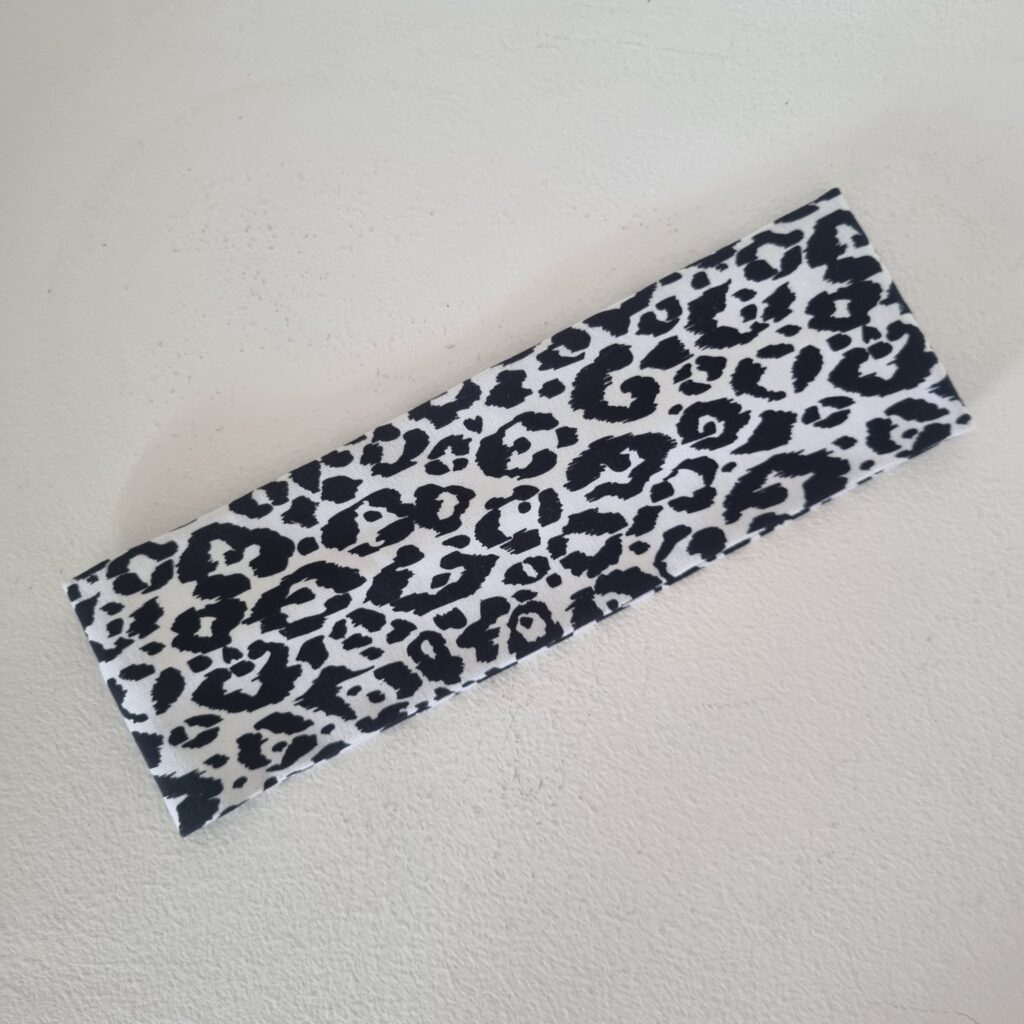 Pannband leopard svart/vit